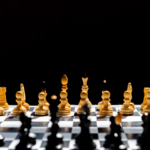 Chess Grandmasters and Card Players Share a Brain, Not a Board